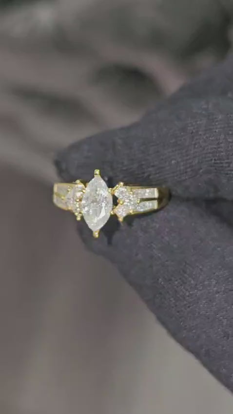14K Yellow gold. 0.80CT Marquise Cut Diamond Ring
